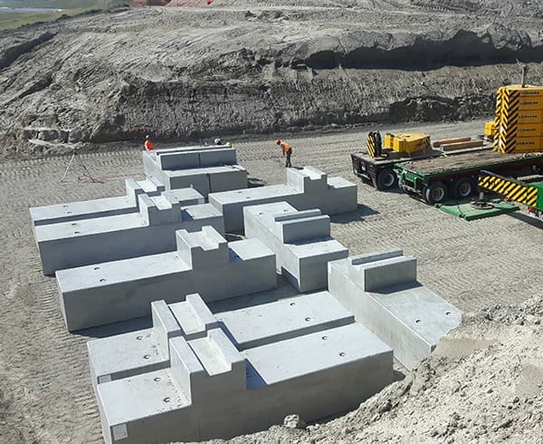 Large sections of concrete used to build a wall