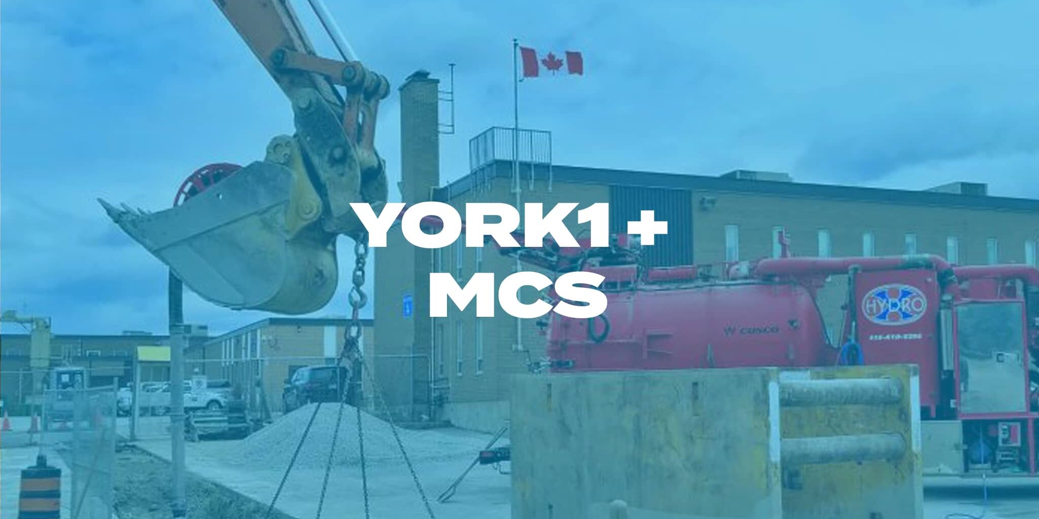 Hydrovac truck and excavator on a job site. Photo with blue overlay, York1 + MCS in white text.