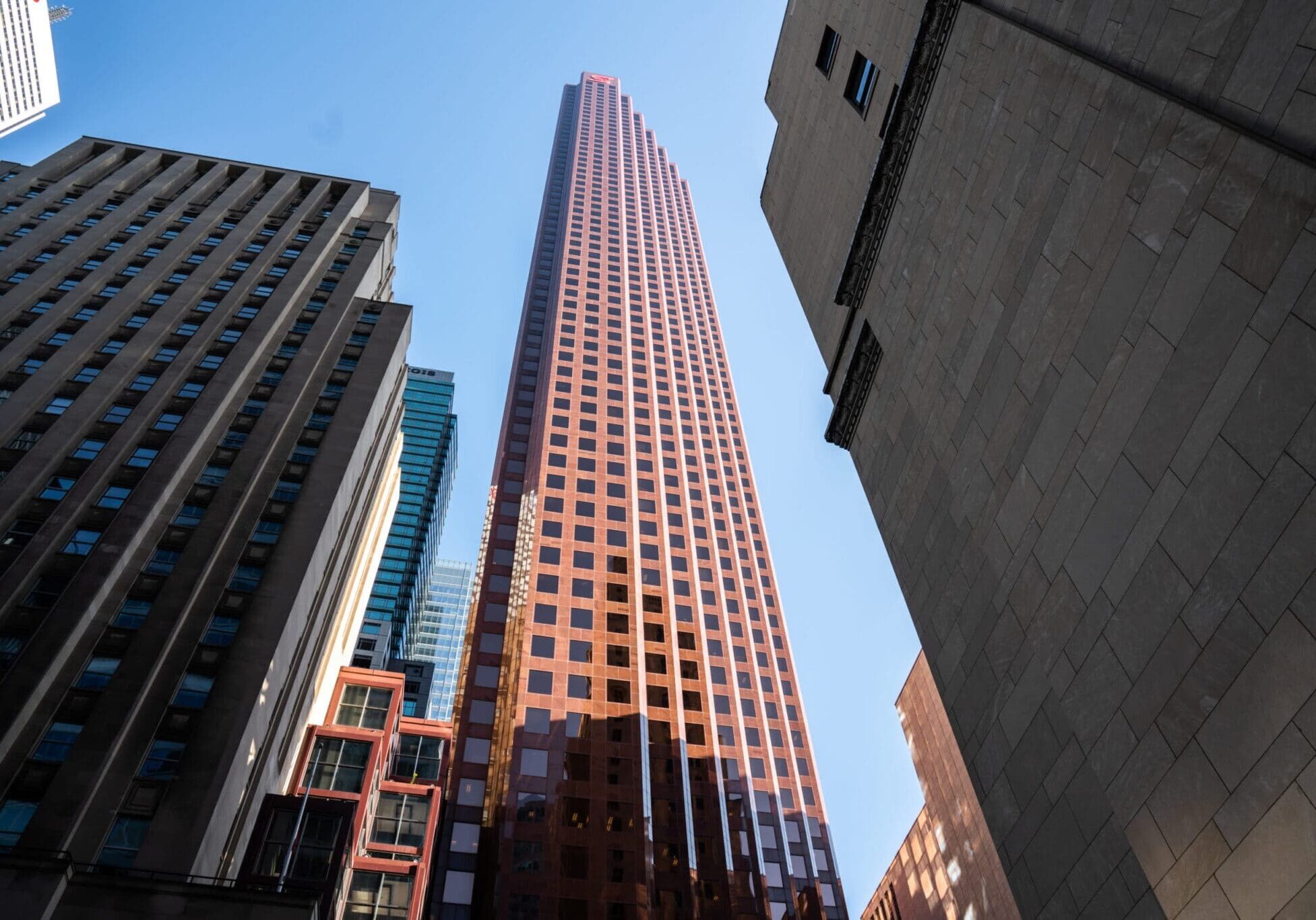 Looking up at the Scotia Plaza and surrounding skyscrapers on a sunny day